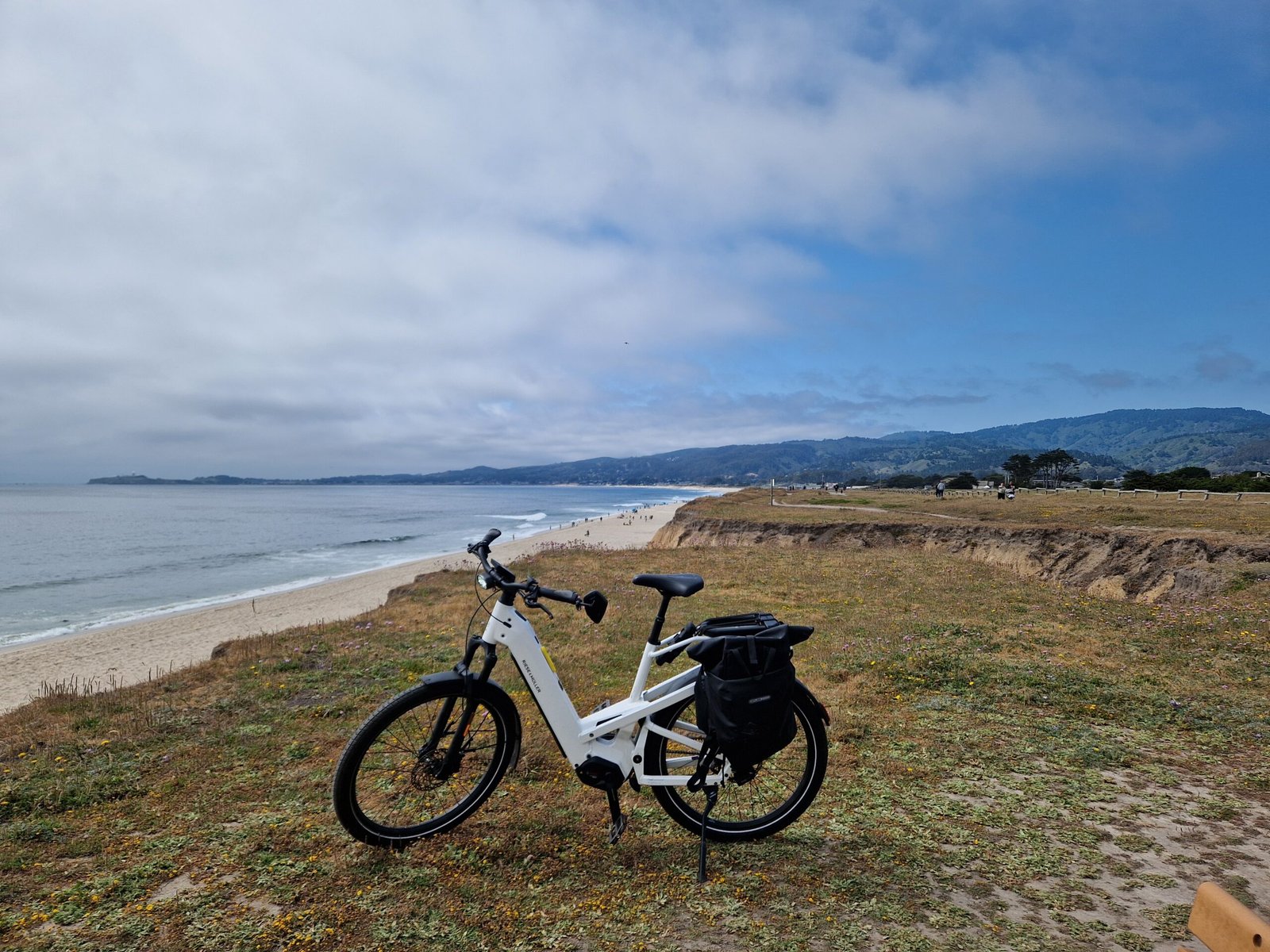 A landscape and a bike representing Americans using how are you in conversations.